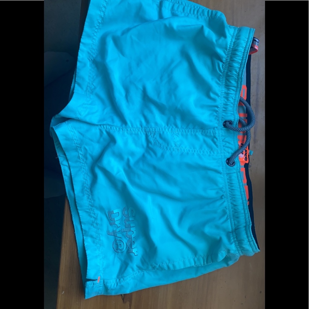 light blue swim shorts